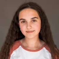 Profile photo of Elena P., a happy sports fan.